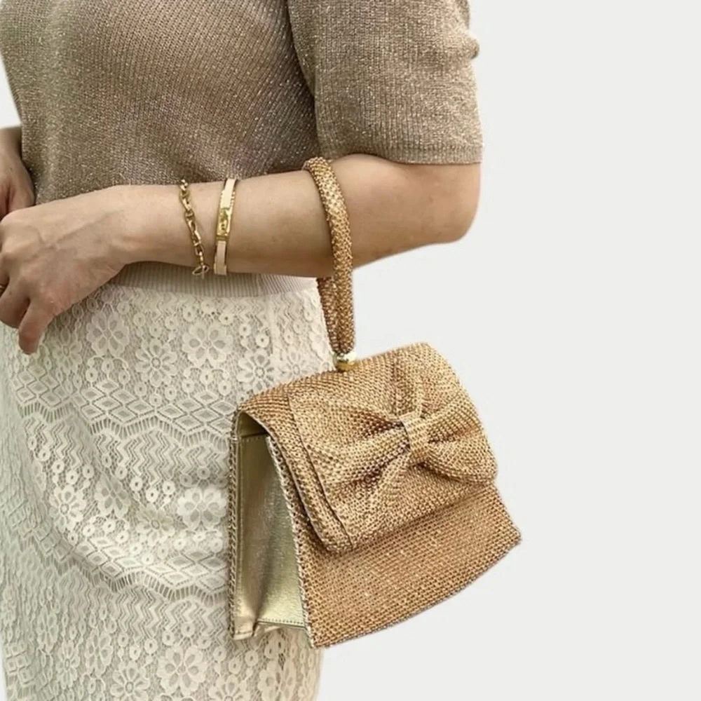 Silver Bag With a Removable Strap